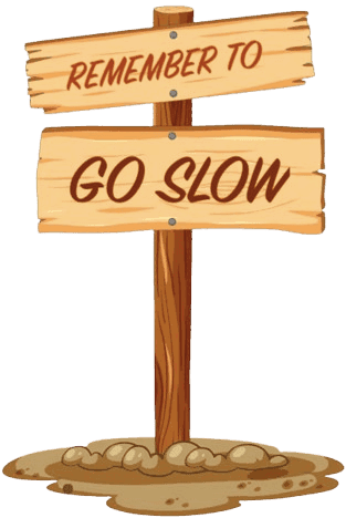 Sign post that reads: Remember to go slow